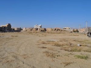 <p>Fig. 2. Ahranjan Tepe and the extent of the destroyed area of the ancient mound (photo: Gh. Ebrahimi)</p>
