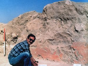 <p>Fig. 5. Part of the red wall painting with Bahman Kargar in the foreground. The 1985 excavation (after Yaghma’i, “Yāddāshti bar nakhostin fasl-e kāvoshhā-ye bāstānshenākhti-ye Qalāichi, Bukān,” p. 63).</p>
